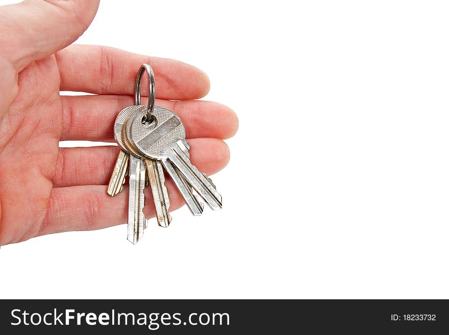 Isolated House Keys In One Hand