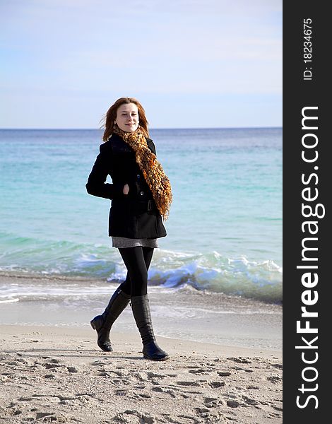 Red-haired Girl At The Beach.