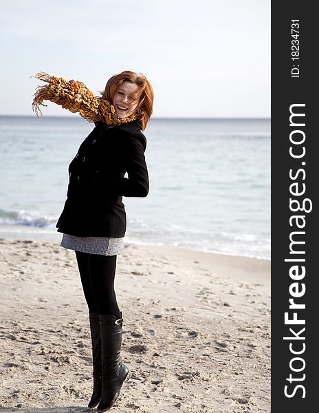 Red-haired Girl At The Beach.