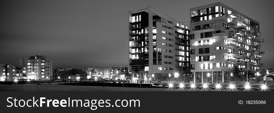 Modern residential buildings at harbour. Black and white. Modern residential buildings at harbour. Black and white.