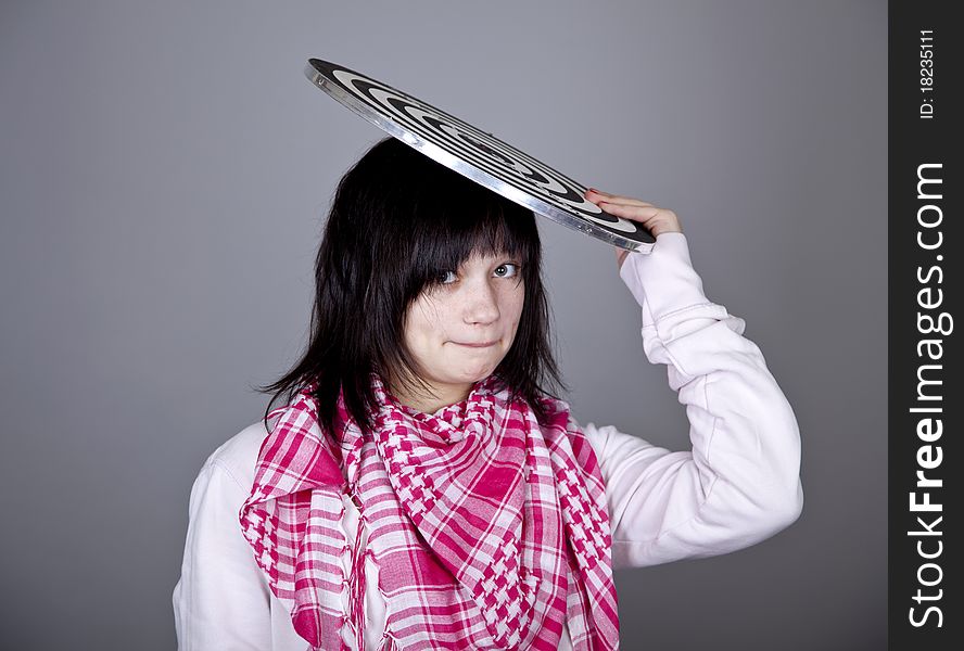 Girl with darts. Studio shot.