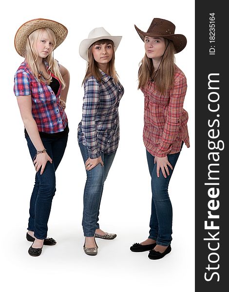 Three girls in hats on white background