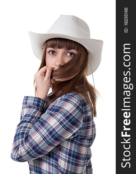 Portrait of a girl in a hat covering the face hair