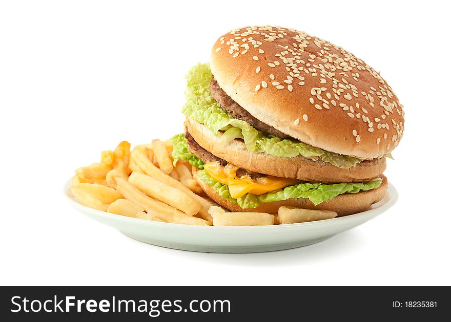 Cheeseburger with fries on a white background