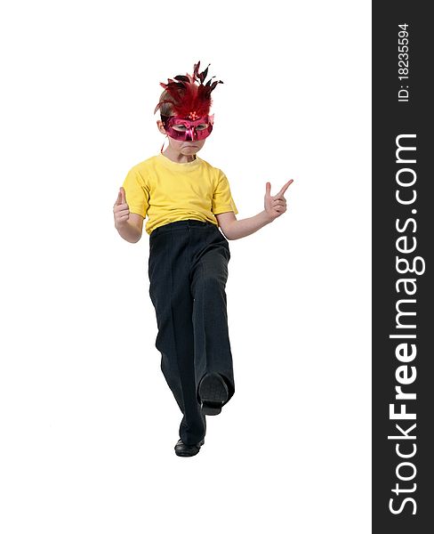 Boy in a red mask with feathers on a white background