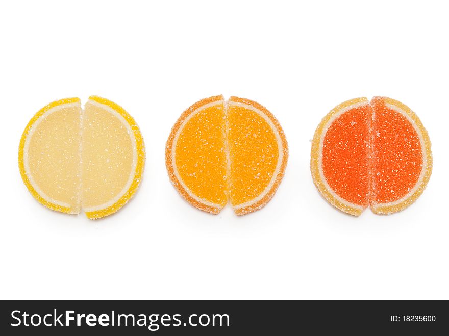 Three round jelly candy on a white background