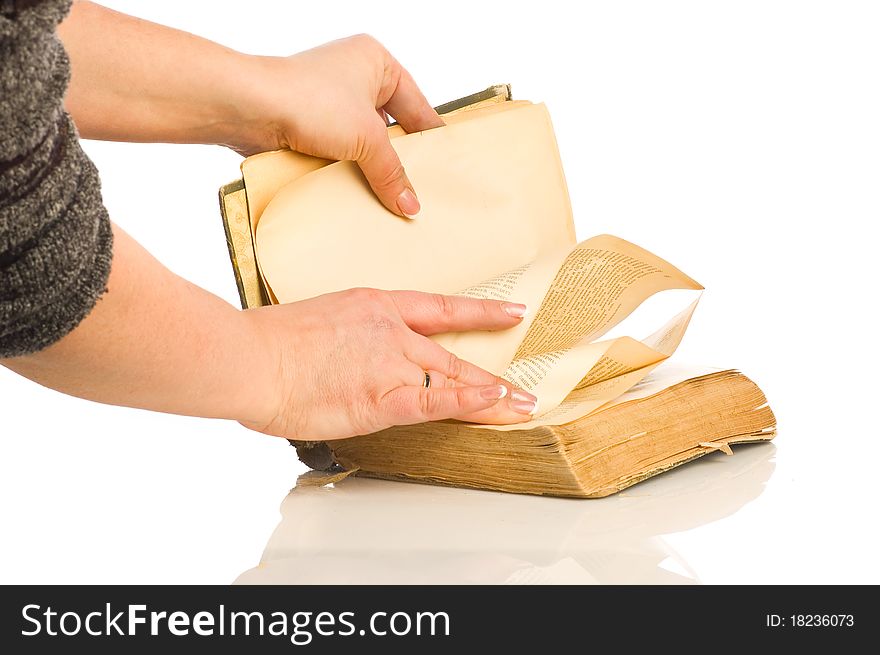 Reading old book isolated on white background