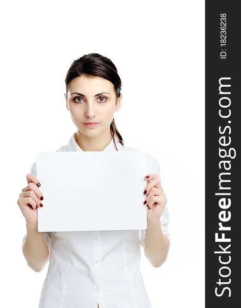 An image of young woman holding white paper. An image of young woman holding white paper