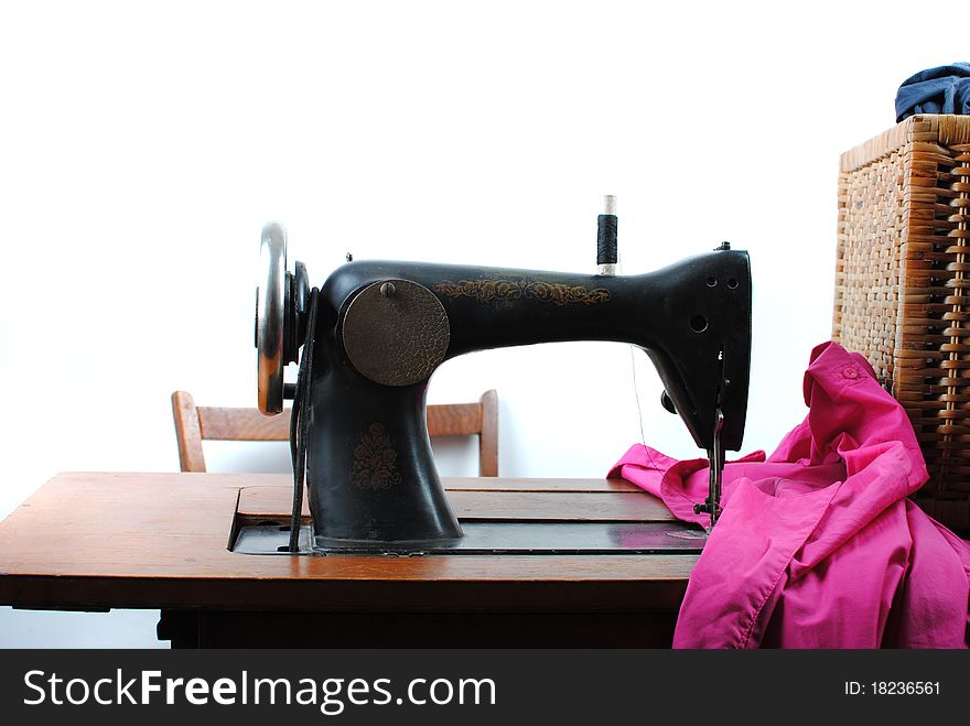 Vintage Sewing machine isolated over a white background