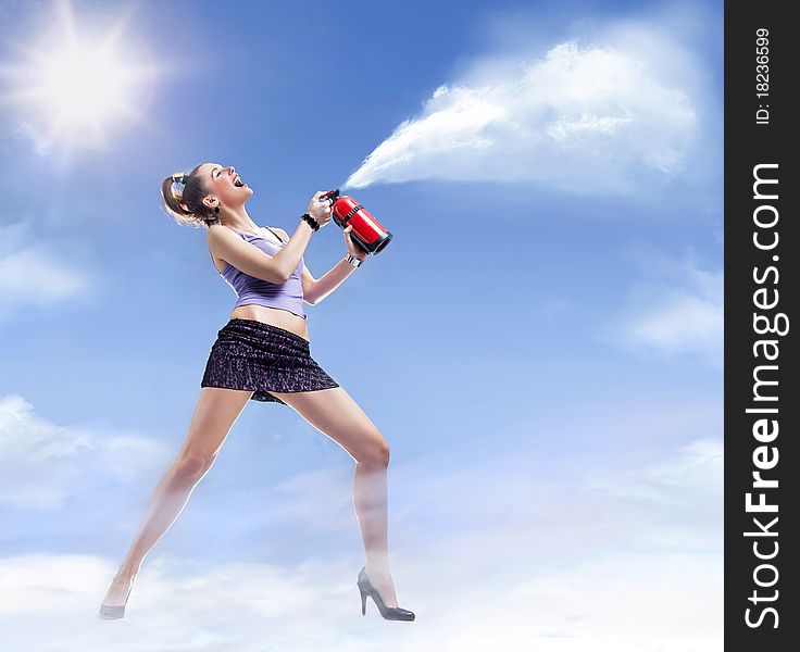 Young beautiful woman with fire extinguisher