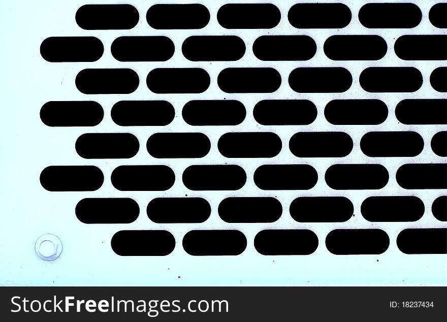 Background of metal plate with holes in blue shade. Background of metal plate with holes in blue shade