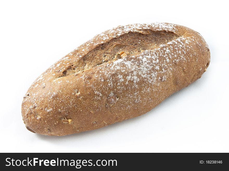 Baked multigrain bread on white background