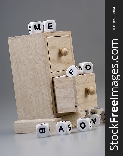 Dice letters in a piece of furniture
