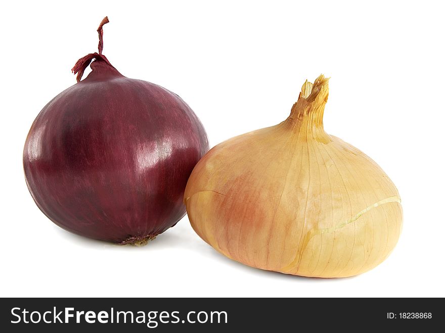 Red and yellow onions on a white background