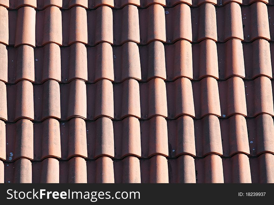 Tiles on a house roof. Tiles on a house roof