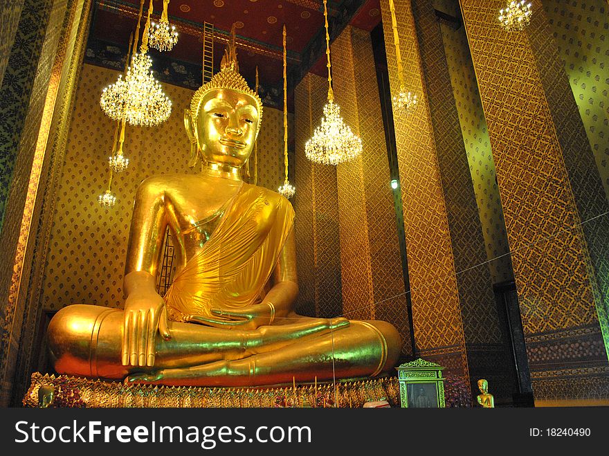 The beautiful buddha statue is in the church