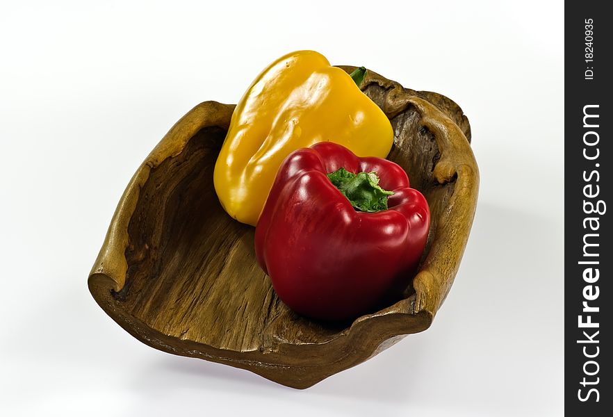 Colorful paprika on wooden tray