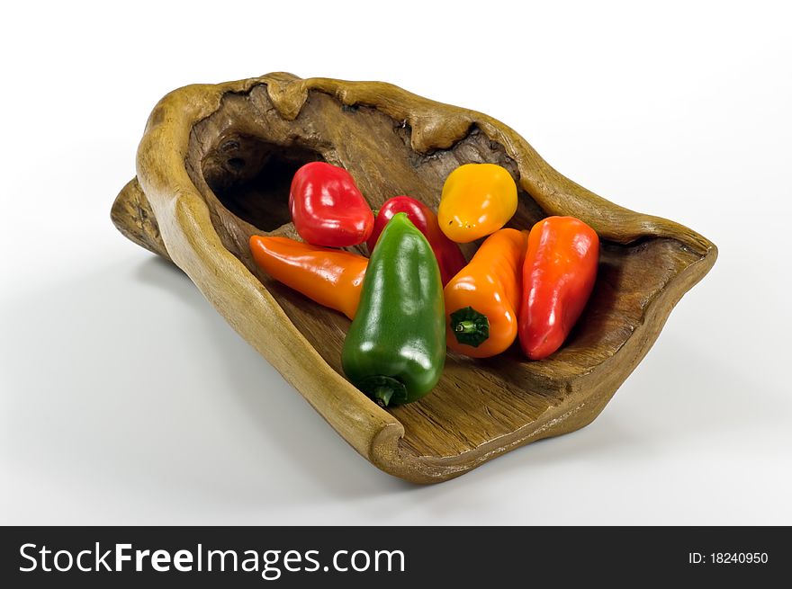 Colorful paprika on wooden tray