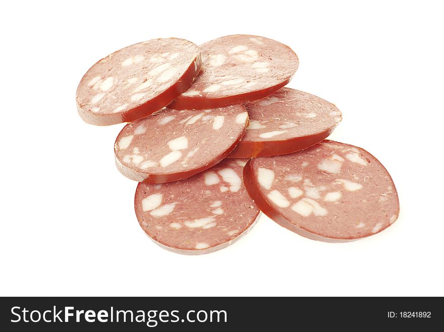 Sausage cut by slices on a white background