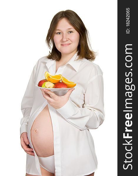 Adorable pregnant woman with healthy meal over white. Adorable pregnant woman with healthy meal over white