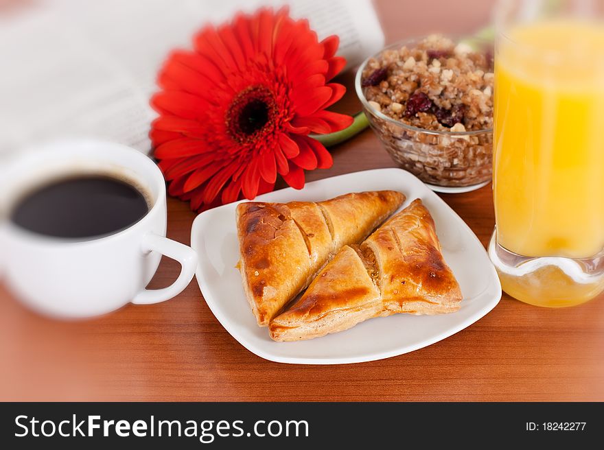 Continental breakfast served with coffee and orange juice.