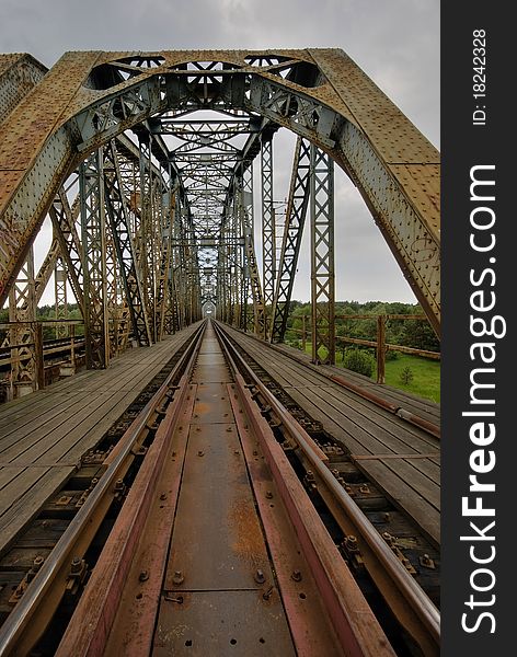 Railway line with the iron bridge