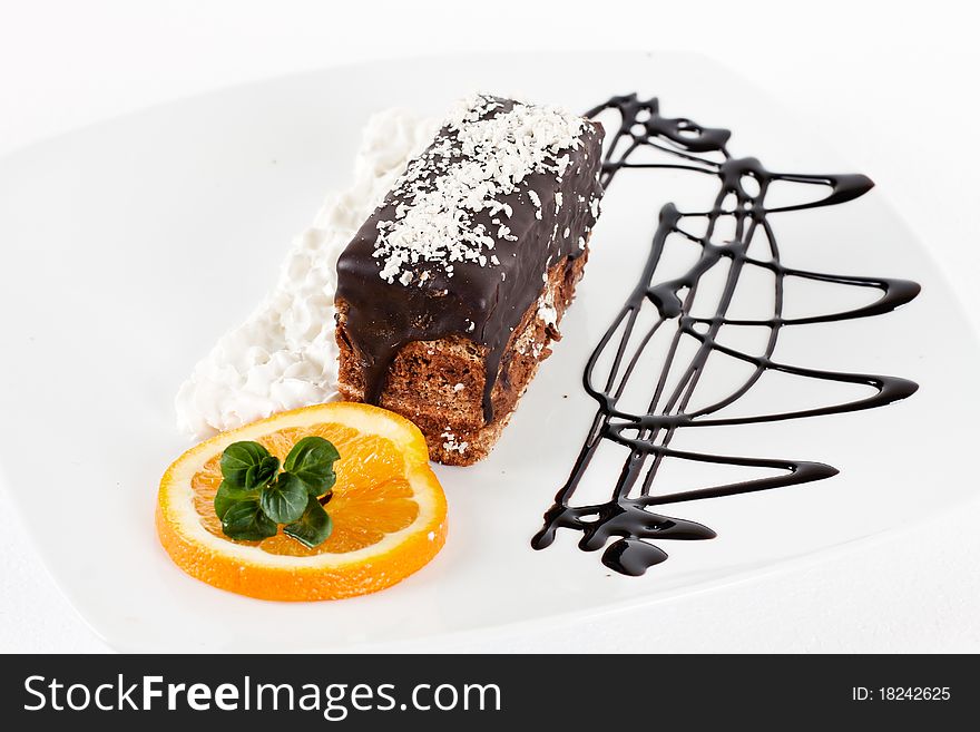 Chocolate dessert with orange and mint.