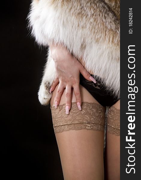 Part of female body with fur and underwear