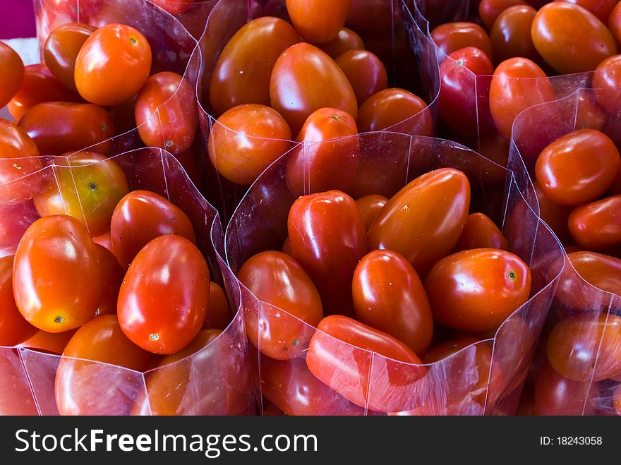 The Colorful of tomatos in bag at market