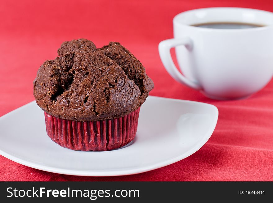 Chocolate muffins with cup of coffee. Chocolate muffins with cup of coffee.