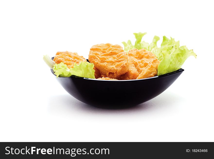 Plate of nuggets with dip isolated on white background. Plate of nuggets with dip isolated on white background