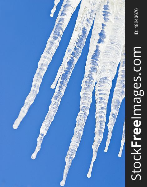 Icicles Against Deep Blue Sky