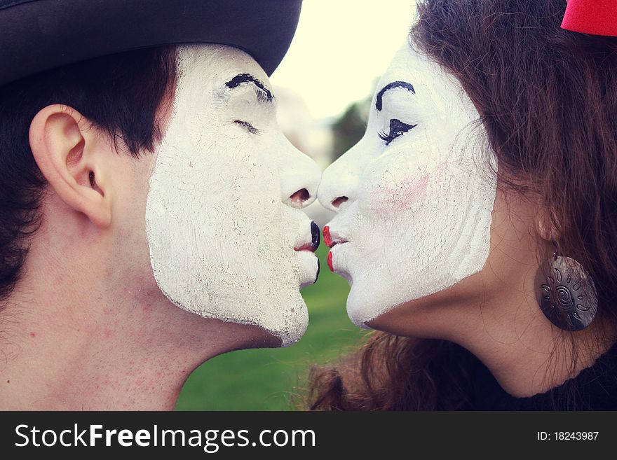 Comedians kissing in the street