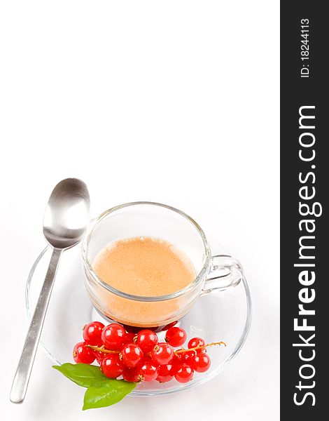 Photo of espresso with currant in glass cup on white isolated background. Photo of espresso with currant in glass cup on white isolated background