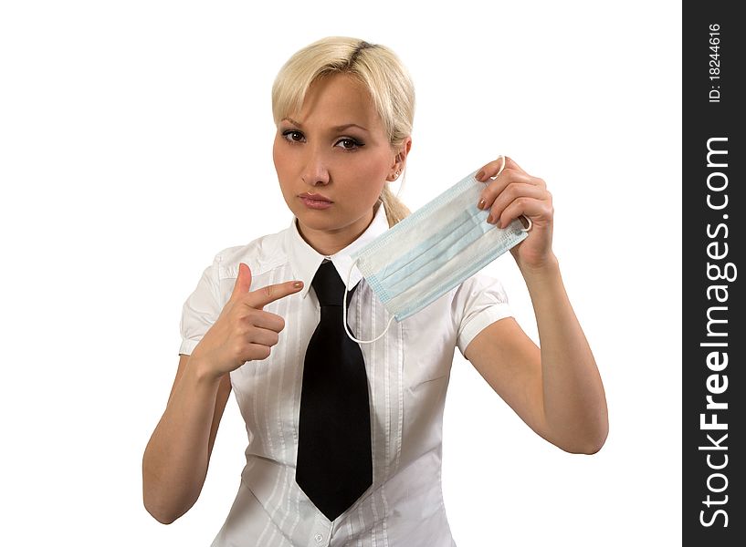 Girl demonstrates surgical mask isolated on a white background. Girl demonstrates surgical mask isolated on a white background.