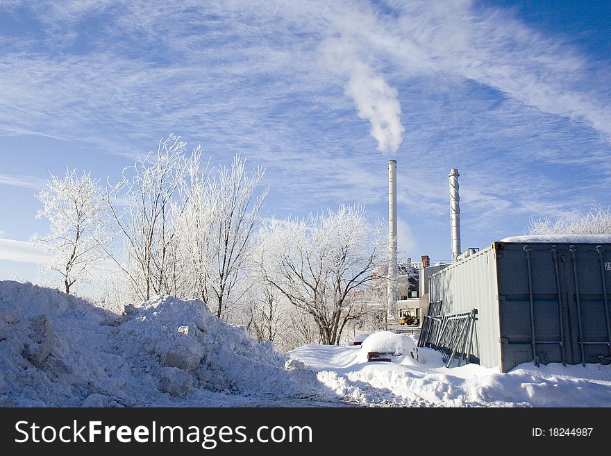 Industrial scene with snow and smokestacks. Industrial scene with snow and smokestacks