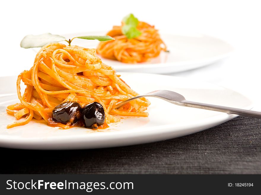 Spaghetti with olives and tomatoesauce. Spaghetti with olives and tomatoesauce