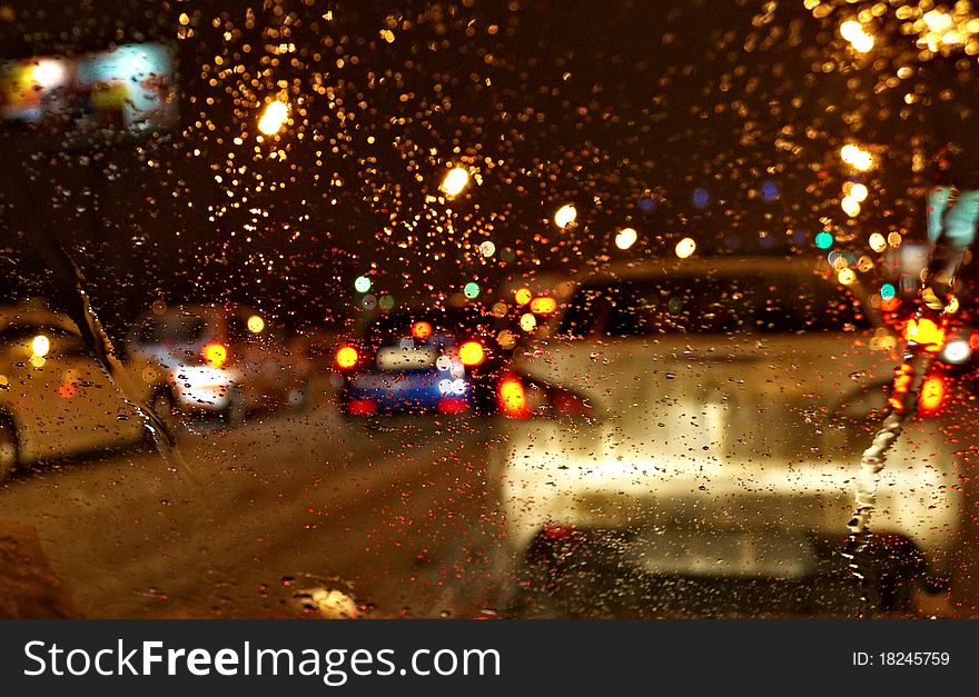 Kind from the car when in the street a rain. Kind from the car when in the street a rain