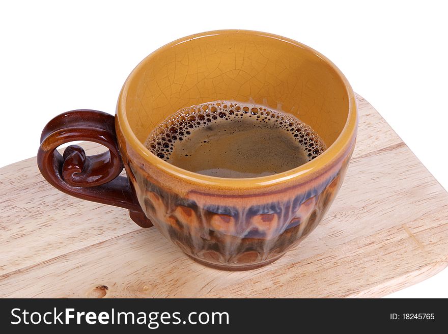 Espresso cup closeup on a white background. Sharpen foam coffee