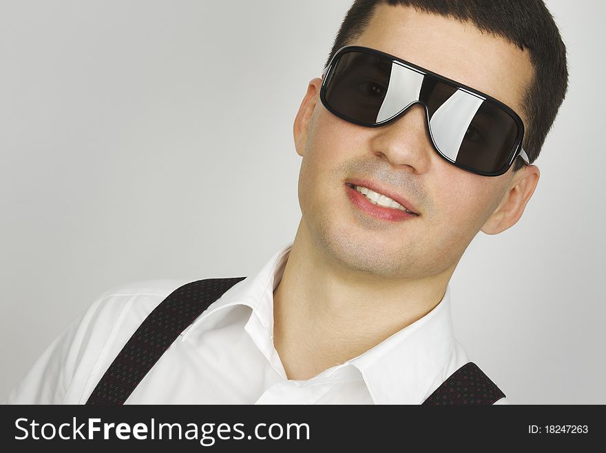 Classic portrait of young man with sunglasses. Classic portrait of young man with sunglasses