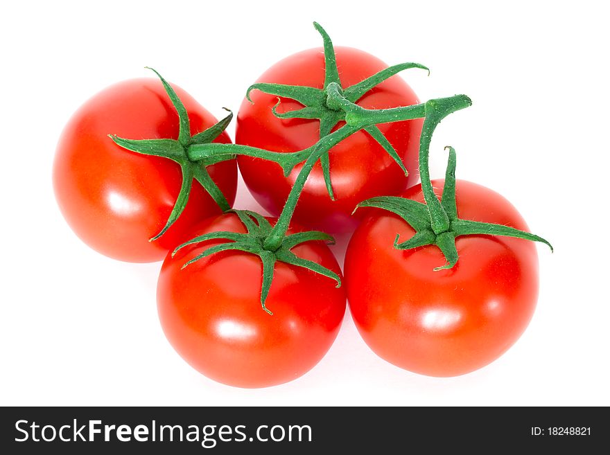 Organic tomatos on white background