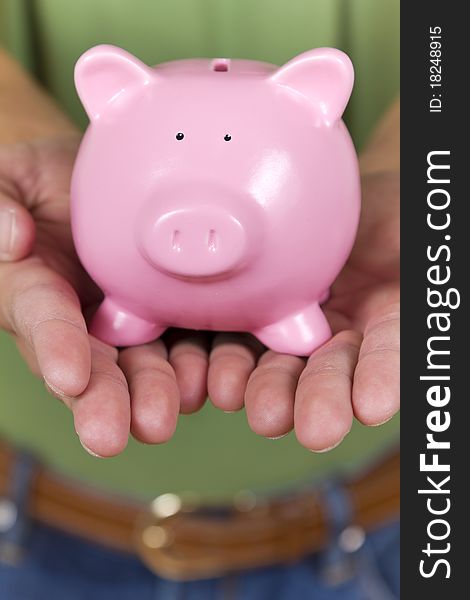 Little  pink piggy bank meaning savings.