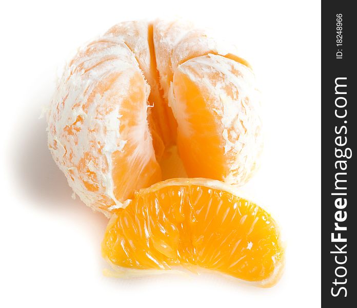 Peeled tangerine on white background