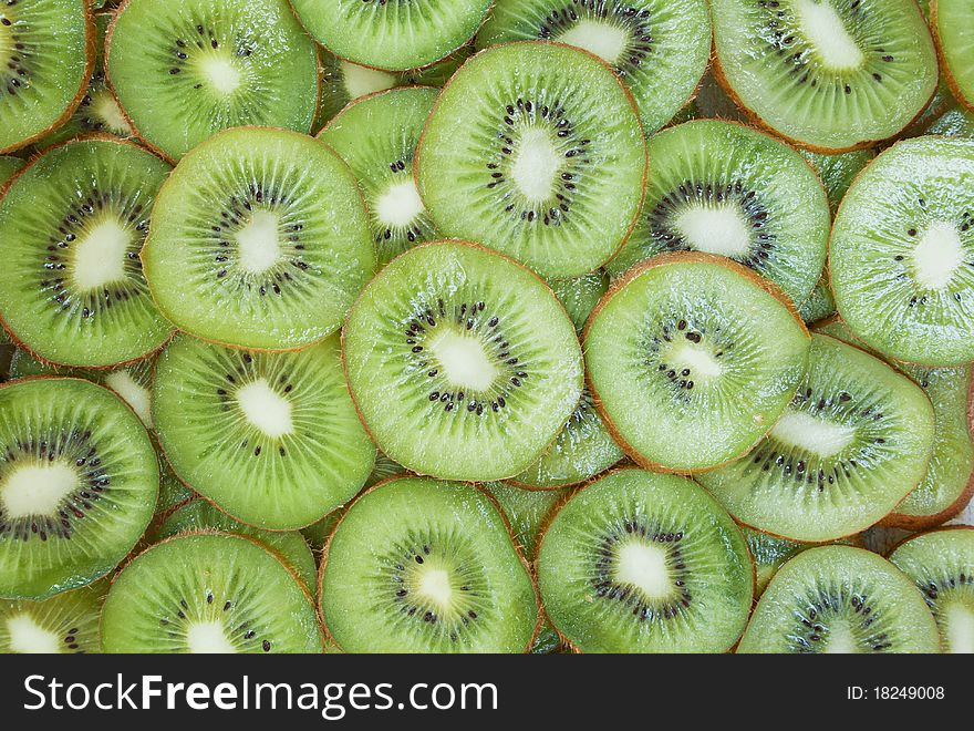 Sliised freshness ripe kiwi background. Sliised freshness ripe kiwi background