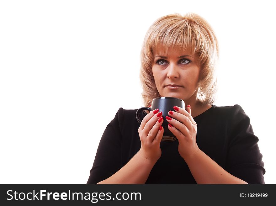 Woman's blonde holding a mug of hot tea on white background