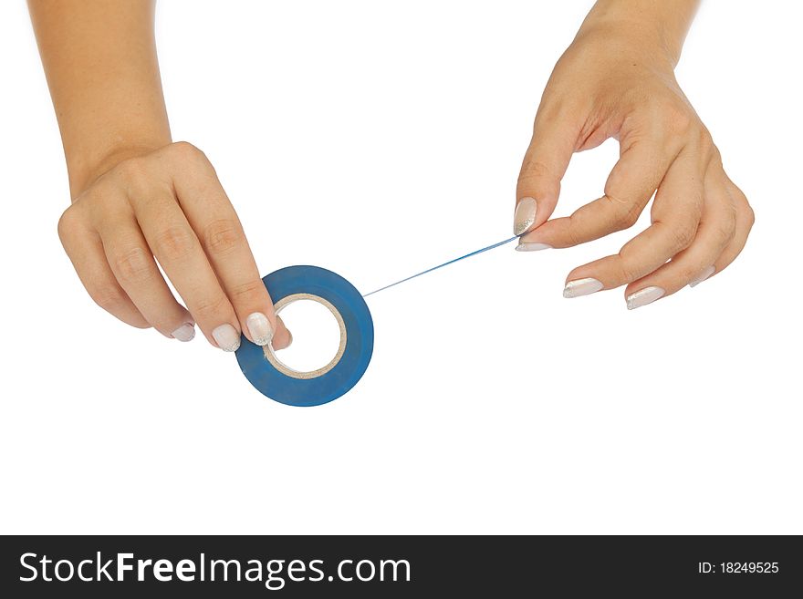 Isolate of a woman's hand holding the blue tape on a white background