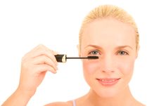 Woman Applying Mascara Royalty Free Stock Images Woman Applying Mascara Royalty Free Stock Images