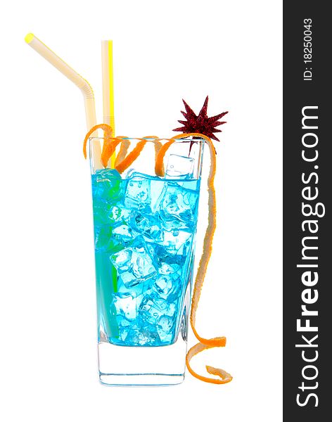 Classic Blue Hawaiian Cocktail with vodka, light rum, gin, tequila, blue curacao, lime juice, lemonade, two yellow striped straws, twisted orange and christmas star isolated on a white background. Classic Blue Hawaiian Cocktail with vodka, light rum, gin, tequila, blue curacao, lime juice, lemonade, two yellow striped straws, twisted orange and christmas star isolated on a white background