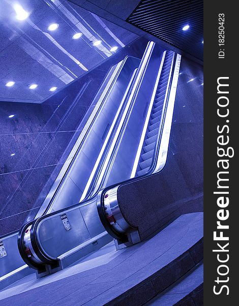 Stopped escalator in blue toning