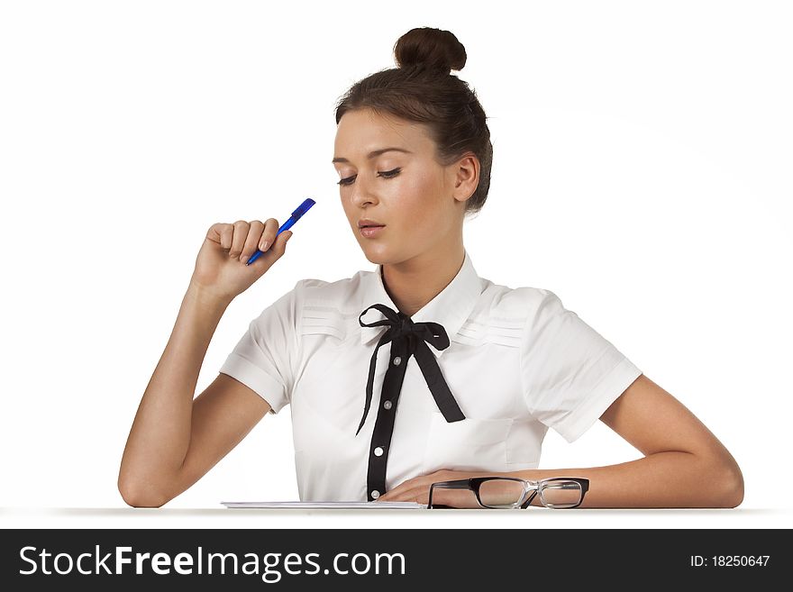 Brunette sitting at the table work with document